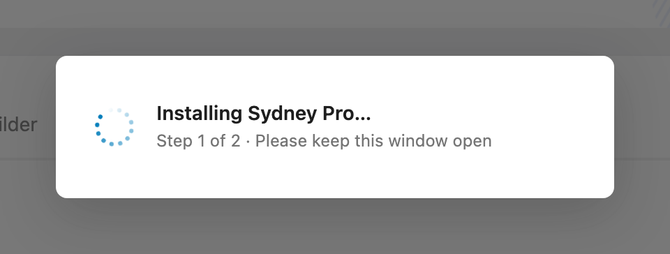 The upgrade popup showing Installing Sydney Pro, step 1 of 2